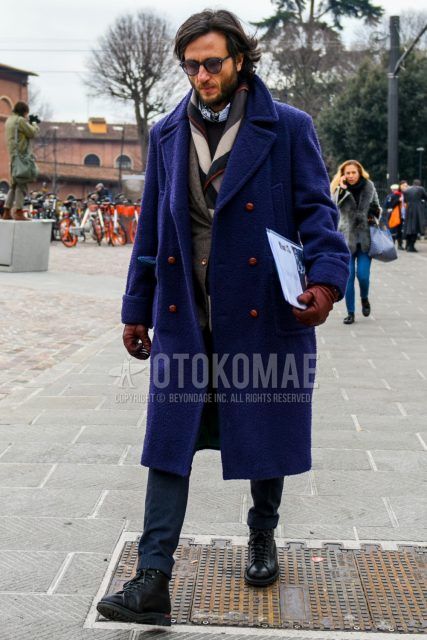 Men's coordinate and outfit with plain sunglasses, multi-colored scarf/stall, plain navy Ulster coat, gray checked tailored jacket, plain black sweater, white/light blue checked shirt, dark gray plain slacks, and black work boots.