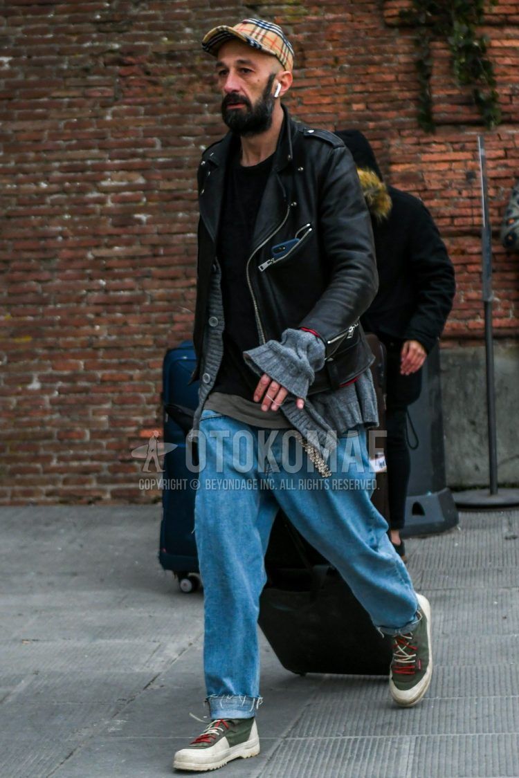 Men's coordinate/outfit with brown checked baseball cap, plain black leather jacket (not riders), plain black t-shirt, plain gray cardigan, gold dot tape belt, plain blue denim/jeans, white high-cut sneakers.
