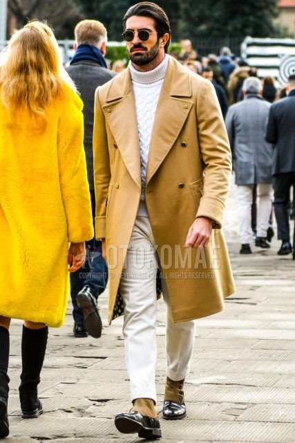 Winter men's coordinate and outfit with round gold plain sunglasses, brown plain Ulster coat, white plain turtleneck knit, white plain slacks, and black/beige boots.