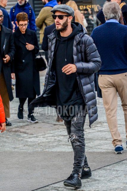 Men's coordinate and outfit with solid color cap, solid color sunglasses, solid color black down jacket, solid color black hoodie, solid color gray denim/jeans, and black low-cut sneakers.