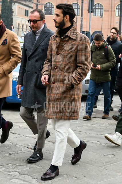 Men's coordinate and outfit with multi-colored checked stainless steel coat, plain black turtleneck knit, plain white cotton pants, plain black socks, and brown tassel loafer leather shoes.