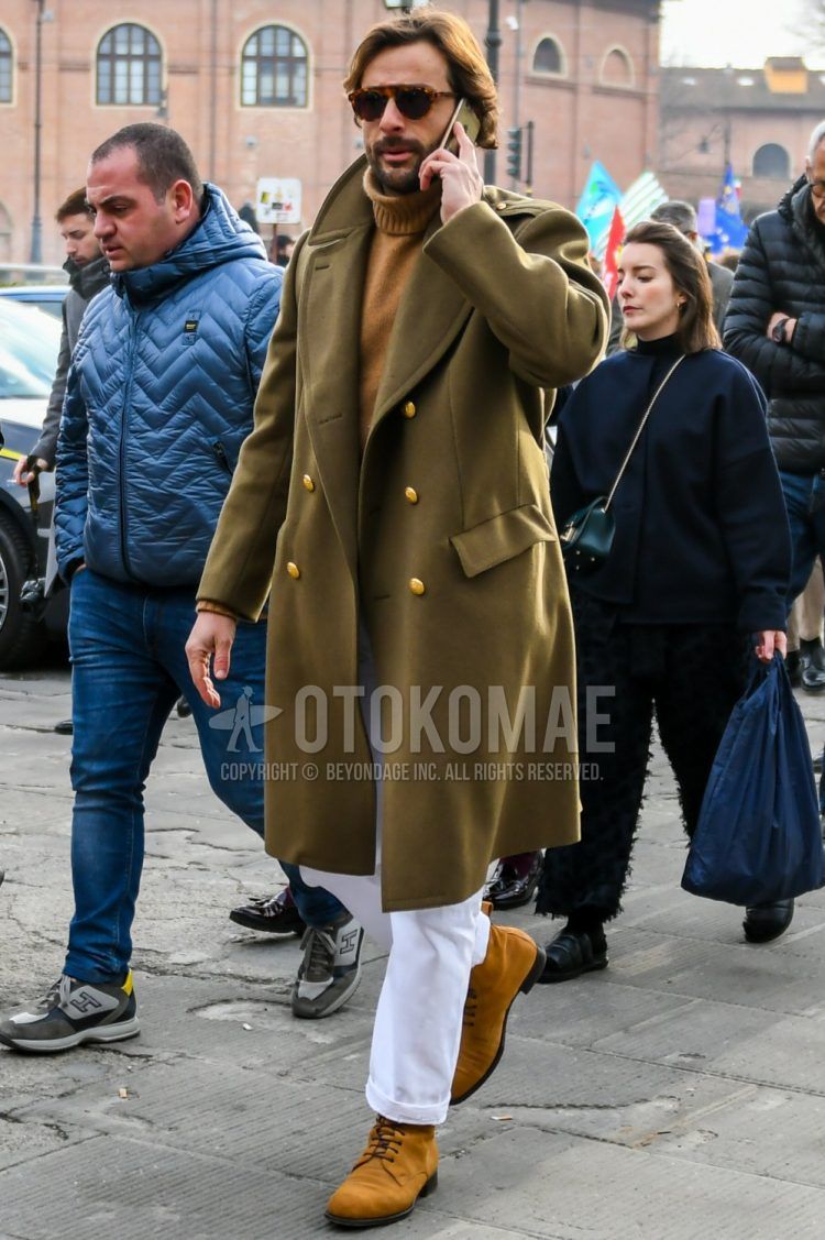 Men's coordinate and outfit with plain sunglasses, olive green plain Ulster coat, beige plain turtleneck knit, white plain cotton pants, and beige boots.