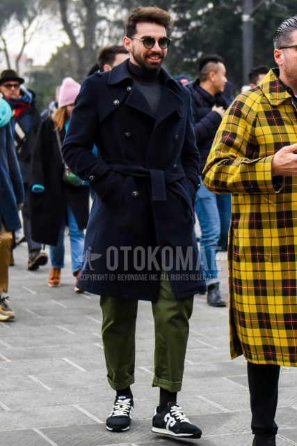 Winter men's coordinate and outfit with black tortoiseshell sunglasses, plain navy trench coat, plain dark gray turtleneck knit, plain olive green chinos, plain black socks, and black low-cut sneakers by Ushroui.