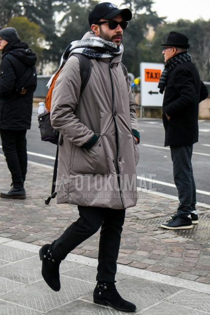 Men's coordinate and outfit with Calvin Klein plain black baseball cap, plain sunglasses, white/black scarf/stall, plain gray down jacket, plain black denim/jeans, and black boots.