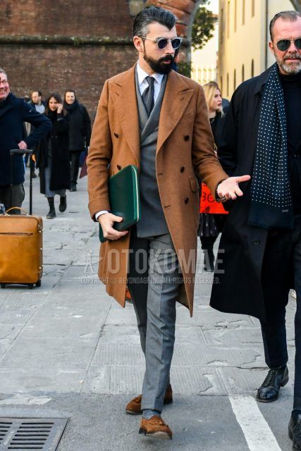 Men's coordinate and outfit with plain brown chester coat, plain white shirt, plain gray socks, brown tassel loafer leather shoes, plain green clutch bag/second bag/drawstring, plain gray suit, and plain gray tie.