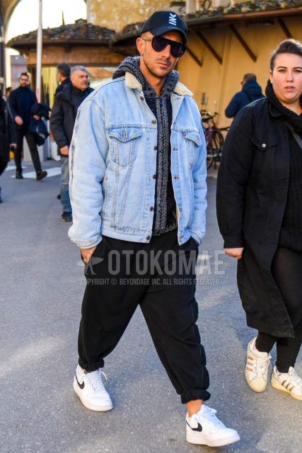 Men's coordinate and outfit with black one-point baseball cap, solid black sunglasses, solid gray scarf/stall, solid blue denim jacket, solid gray cardigan, solid black jogger pants/ribbed pants, Nike Air Force 1 white low-cut sneakers .