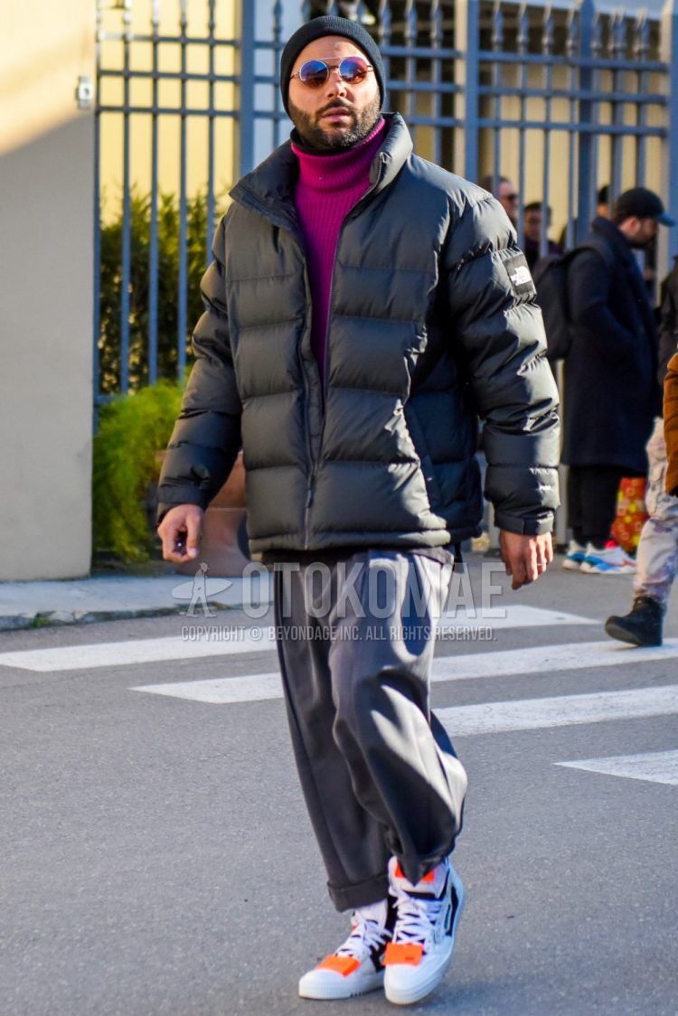 Men's coordinate and outfit with solid black knit cap, solid silver sunglasses, The North Face solid black down jacket, solid purple turtleneck knit, solid gray wide-leg pants, and off-white white low-cut sneakers.