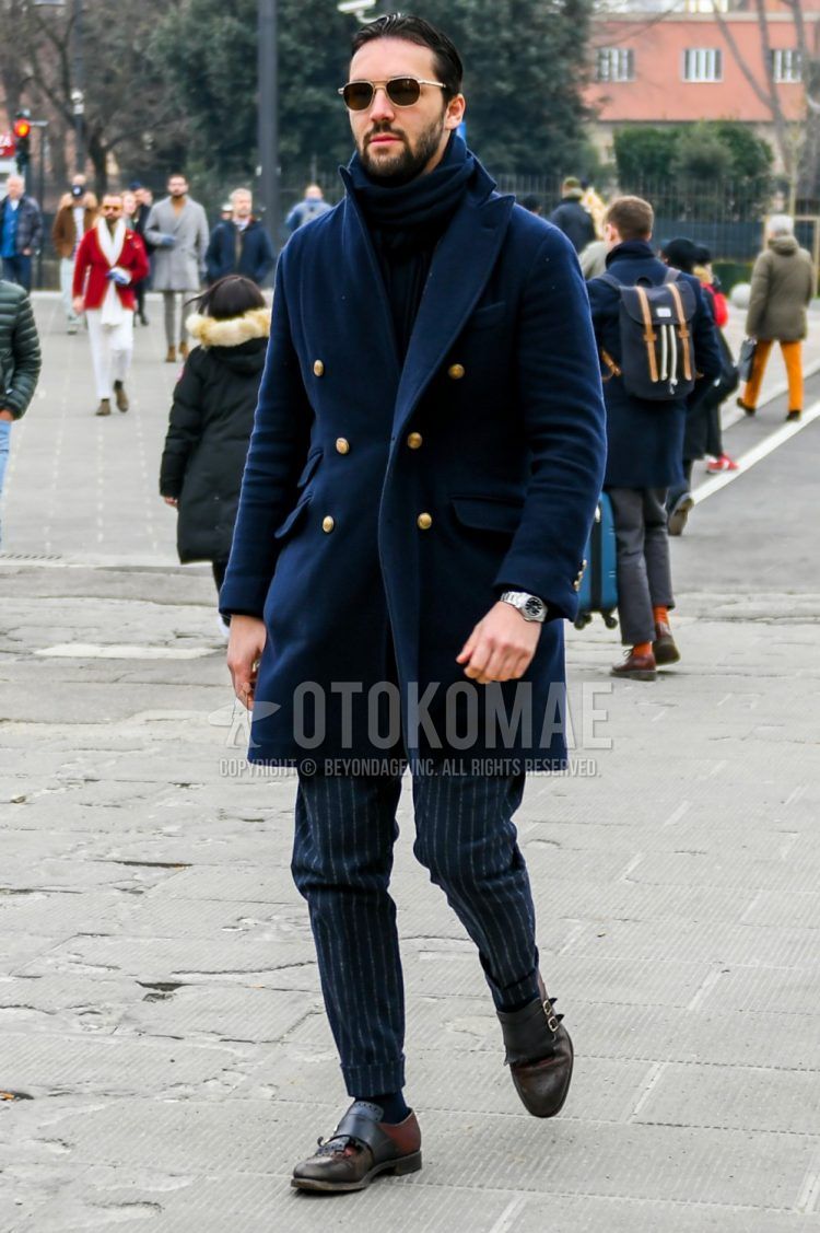 Men's coordinate and outfit with plain sunglasses, plain scarf/stall, plain navy chester coat, navy striped slacks, brown monk shoes leather shoes.
