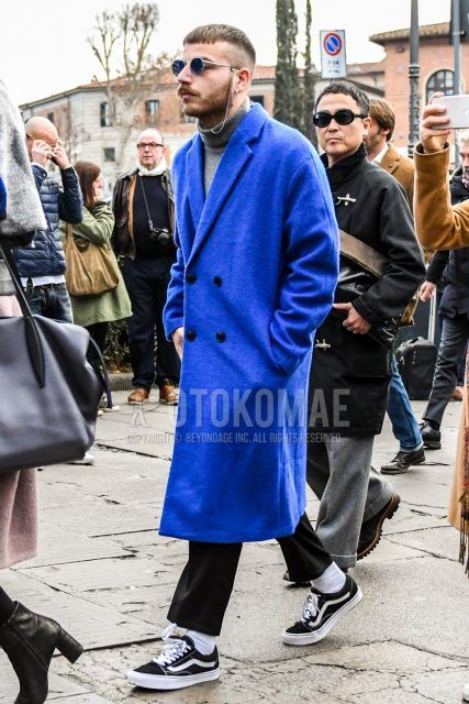 Men's coordinate and outfit with solid color sunglasses, solid color blue chester coat, solid color gray turtleneck knit, solid color black ankle pants, solid color white socks, and black low-cut sneakers by Vans.