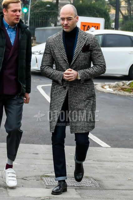 Men's coordinate and outfit with black/white check chester coat, plain navy denim/jeans, and black plain toe leather shoes.