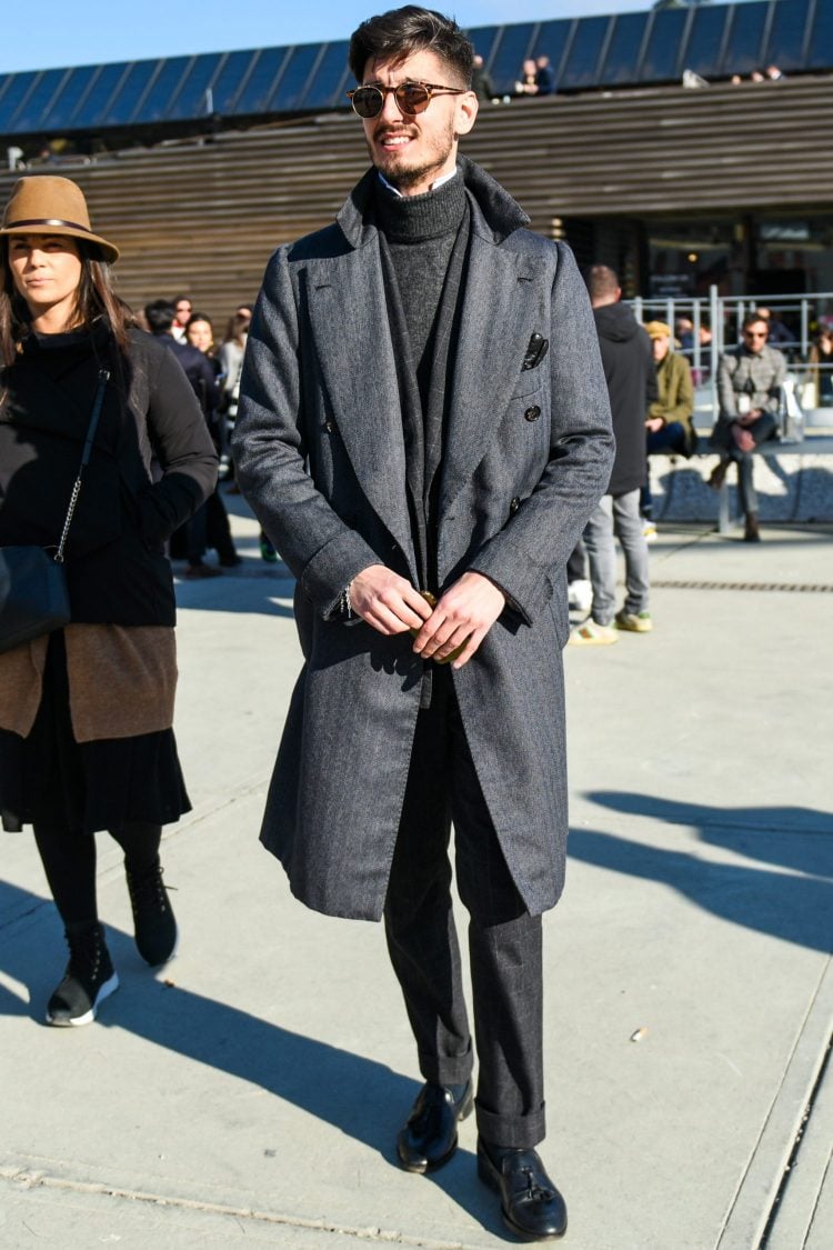Note the petite layered coordinate of showing a shirt from the neck of the turtleneck knit.