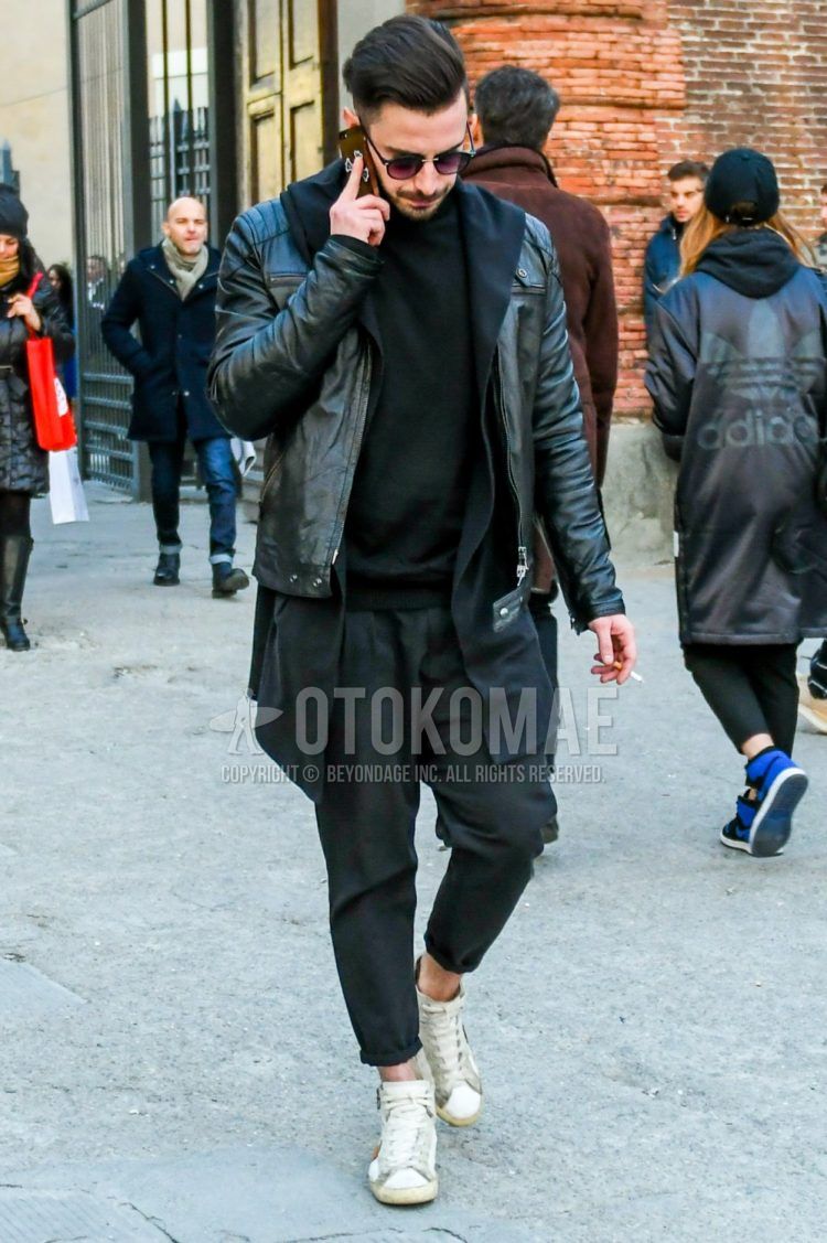 Men's coordinate and outfit with plain black sunglasses, plain black scarf/stall, plain black rider's jacket, plain black turtleneck knit, plain dark gray slacks, and white high-cut sneakers from Boston.