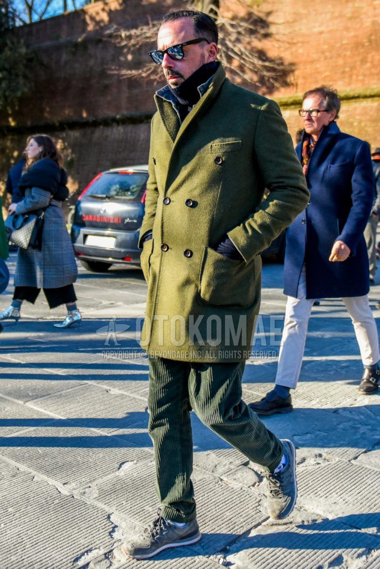 Ray-Ban Wayfarer solid black sunglasses, olive green solid chester coat, blue solid denim jacket, black solid turtleneck knit, olive green solid winter pants (corduroy, velour), New Balance gray low cut sneakers. Men's Codes and Outfits.