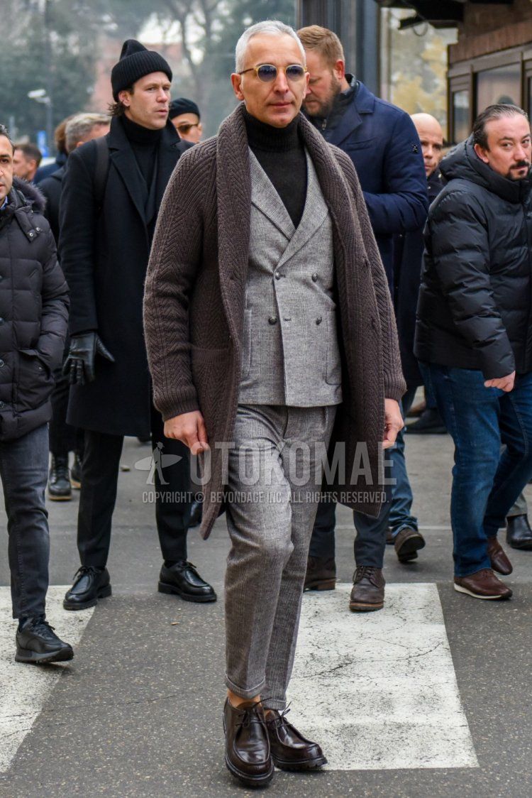 Men's coordinate and outfit with plain sunglasses, plain black turtleneck knit, plain brown cardigan, brown leather shoes, and plain gray suit.