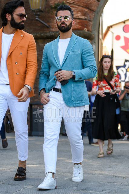 Men's coordinate and outfit with plain gray sunglasses, plain light blue tailored jacket, plain white t-shirt, plain black leather belt, plain white ankle pants, plain denim/jeans, and white low-cut sneakers.