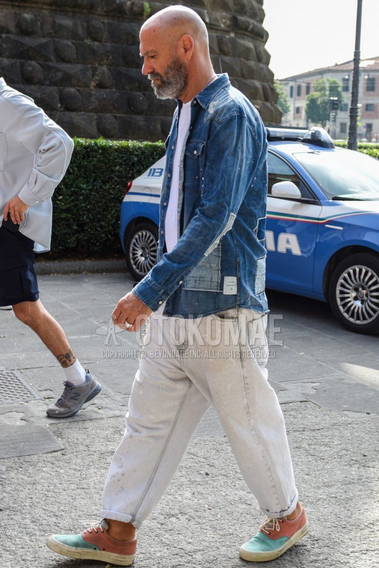 Men's coordinate and outfit with plain blue denim/chambray shirt, plain white t-shirt, plain white denim/jeans, and brown/light blue low-cut sneakers.