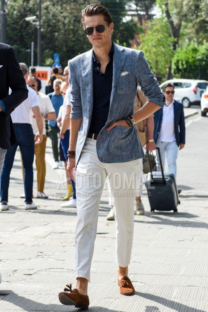 Men's spring/summer/fall outfit with plain black Ray-Ban sunglasses, plain gray tailored jacket, plain navy polo shirt, plain brown leather belt, plain white cotton pants, plain white cropped pants, suede brown tassel loafer leather shoes.