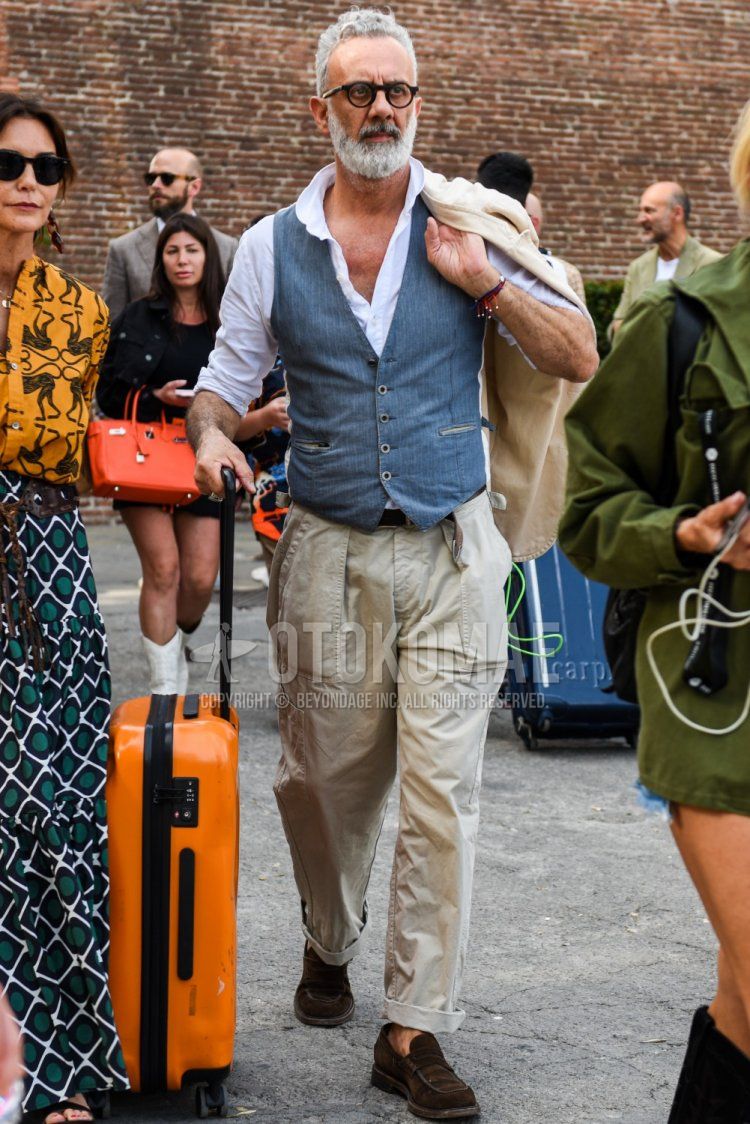 Men's spring and summer coordinate and outfit with plain black glasses, plain gray gilet, plain white shirt, plain black mesh belt, plain beige chinos, and suede brown coin loafer leather shoes.
