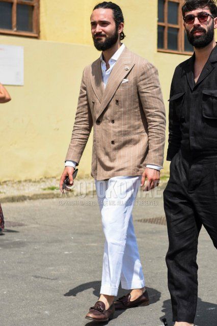Men's spring, summer, and fall coordinate and outfit with beige striped tailored jacket, plain white shirt, plain white slacks, and brown tassel loafer leather shoes.