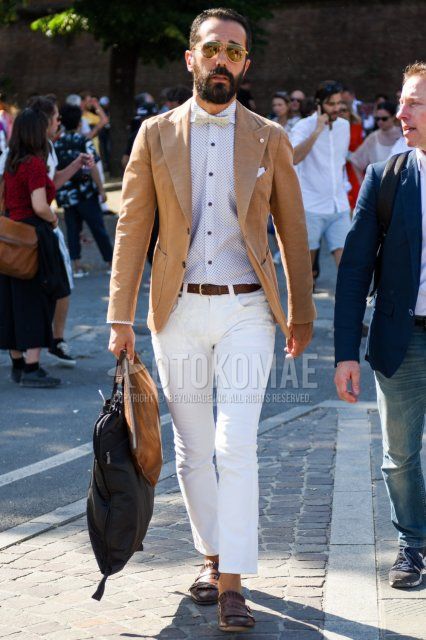 Teardrop gold solid sunglasses, solid beige tailored jacket, solid white shirt, solid brown leather belt, solid white cotton pants, brown loafer leather shoes, solid brown clutch bag/second bag/drawstring, solid beige bow tie Spring Men's summer/autumn coordination/outfits.