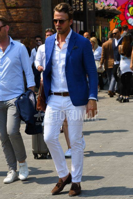 Men's spring, summer, and fall coordinate and outfit with tortoiseshell sunglasses, plain blue tailored jacket, plain white shirt, plain brown leather belt, plain mesh belt, plain white cotton pants, brown tassel loafers leather shoes, and suede shoes leather shoes.