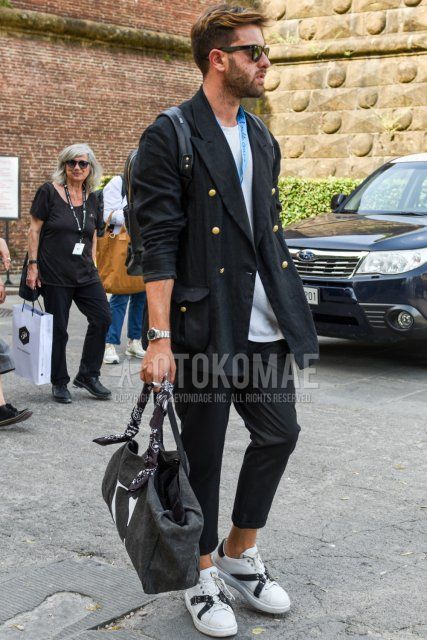 Men's spring, summer, and fall coordinate and outfit with plain Wellington sunglasses, plain black tailored jacket, plain white T-shirt, plain black ankle pants, white low-cut sneakers, and dark gray solid color Boston bag.