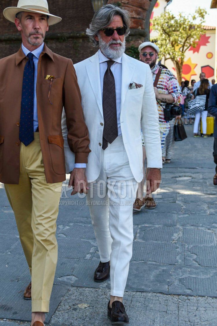 Men's spring, summer, and fall outfits and outfits with plain black sunglasses, plain white shirt, brown tassel loafer leather shoes, plain white suit, and plain brown tie.