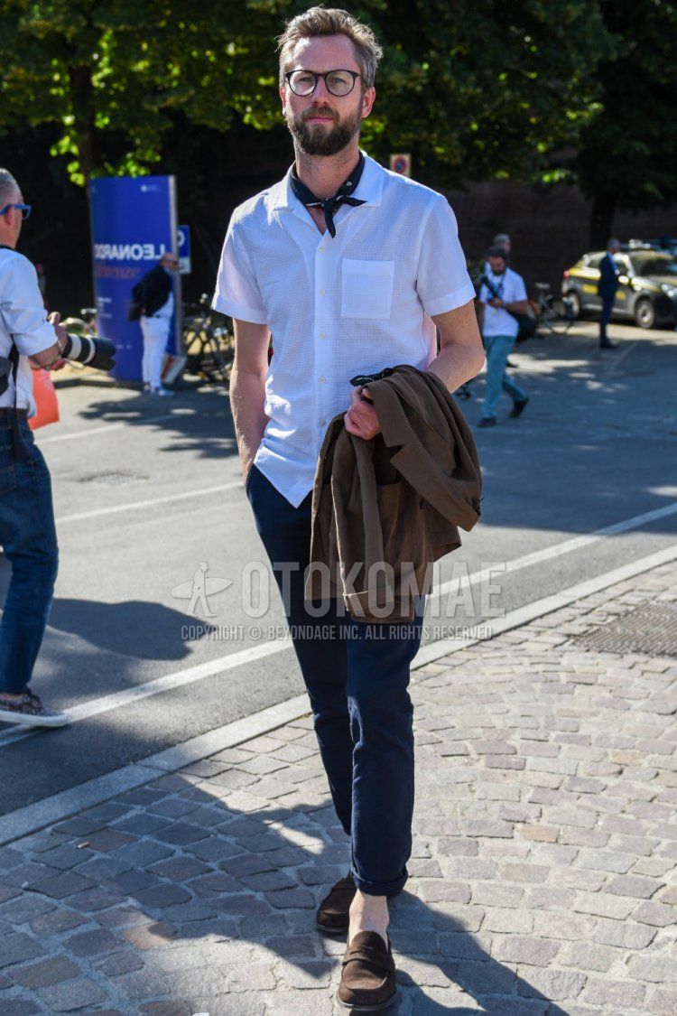 A summer men's coordinate and outfit with plain black glasses, plain black bandana/neckerchief, plain white shirt, plain navy cotton pants, and suede brown coin loafer leather shoes.