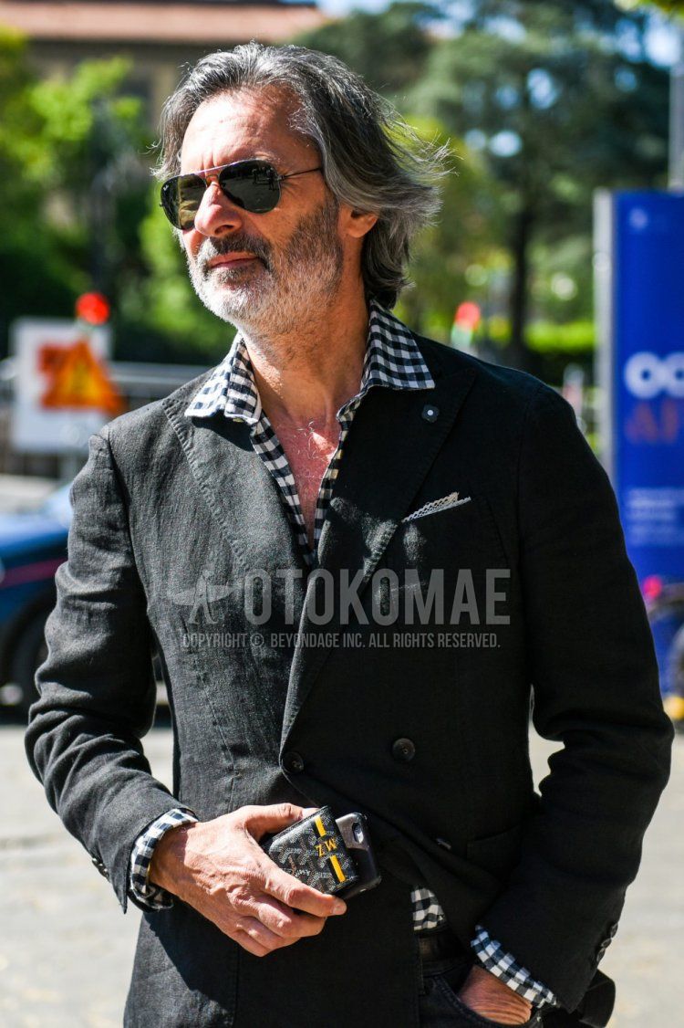 Teardrop Ray-Ban Aviator plain black sunglasses, Lardini Linen plain black tailored jacket and linen black and white checked shirt for men in spring and summer.