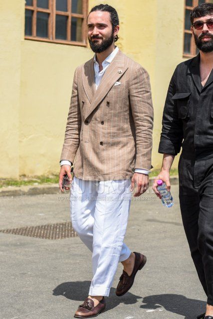 Men's spring, summer, and fall coordinate and outfit with beige striped tailored jacket, plain white shirt, plain white slacks, and brown tassel loafer leather shoes.