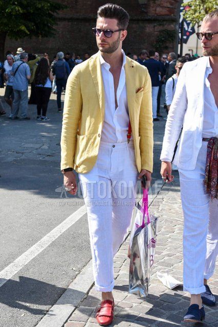 Men's spring, summer, and fall coordinate and outfit with brown tortoiseshell sunglasses, plain yellow tailored jacket, plain white shirt, plain red suspenders, plain white linen slacks, and red loafer leather shoes.