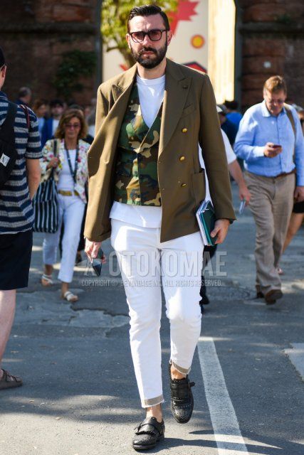 Men's spring, summer, and fall coordinate and outfit with plain black sunglasses, plain olive green tailored jacket, multi-colored camouflage gilet, plain white T-shirt, plain white ankle pants, and black monk shoe leather shoes.