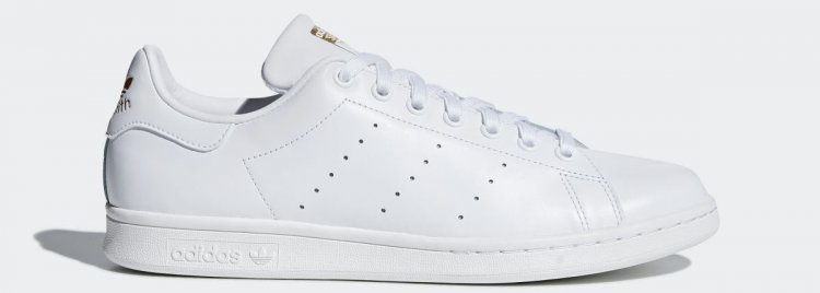 Tennis shoes (court-style sneakers) "add a classy and sophisticated touch.