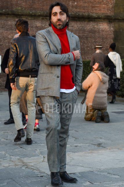 Men's spring and fall coordination and outfit with red plain turtleneck knit, black work boots, and gray check suit.