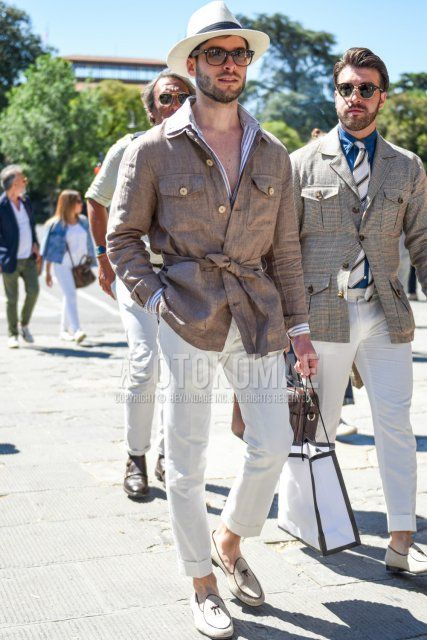 Men's spring/summer coordinate and outfit with solid beige hat, solid black Wellington Ray-Ban sunglasses, solid beige safari jacket, gray striped shirt, solid white slacks, and white tassel loafer leather shoes.