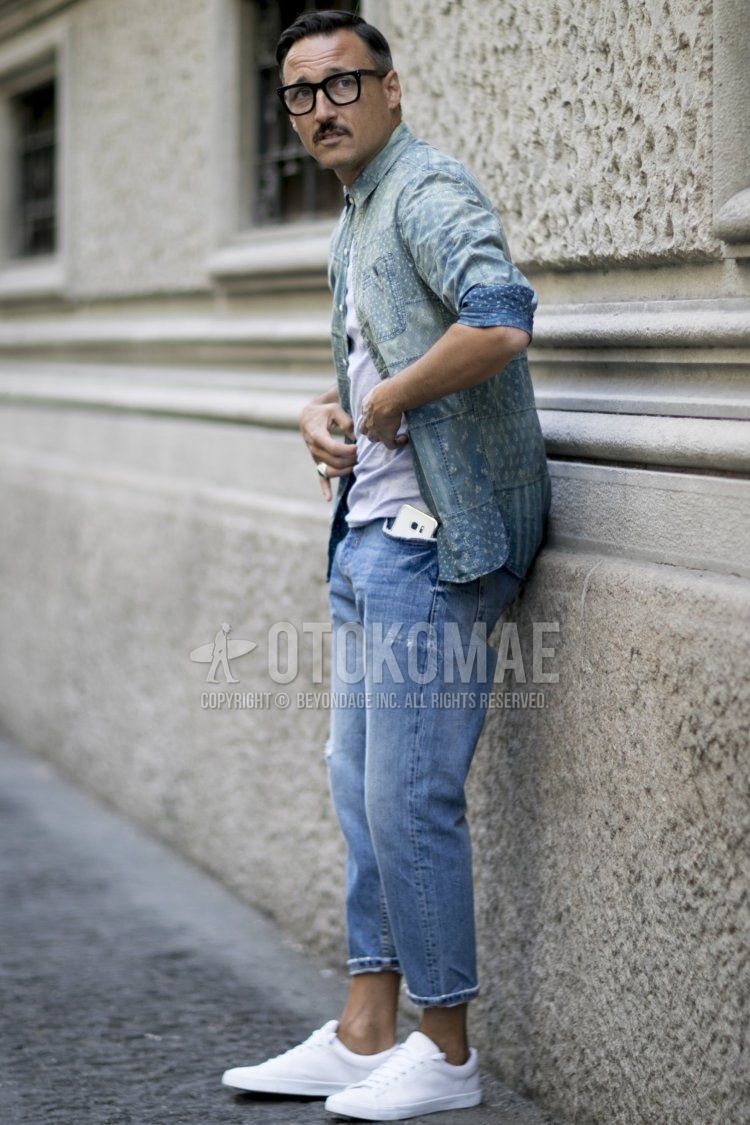 Advanced denim-on-denim with a patchwork denim shirt and washed slim jeans