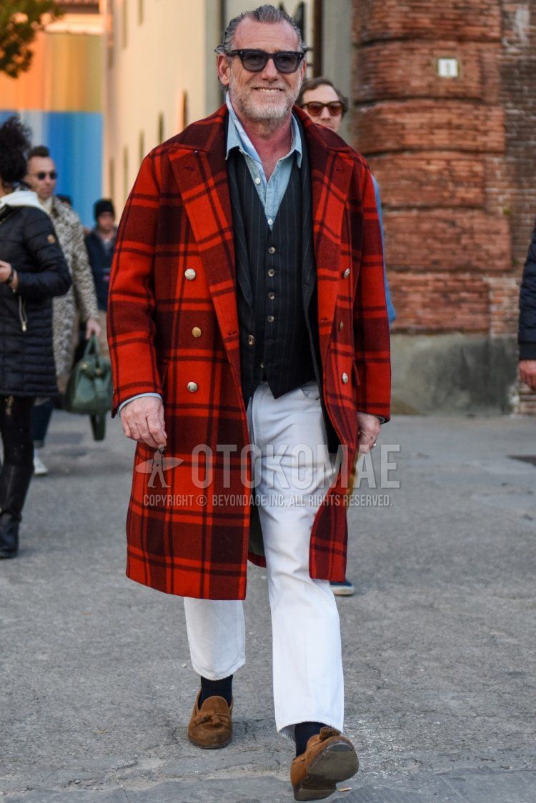 Solid black sunglasses, red checked chester coat, gray striped tailored jacket, gray striped gilet, solid light blue denim/chambray shirt, solid white cotton pants, solid white ankle pants, dark gray solid socks, suede brown tassel loafer leather shoes for men's fall/winter outfits.