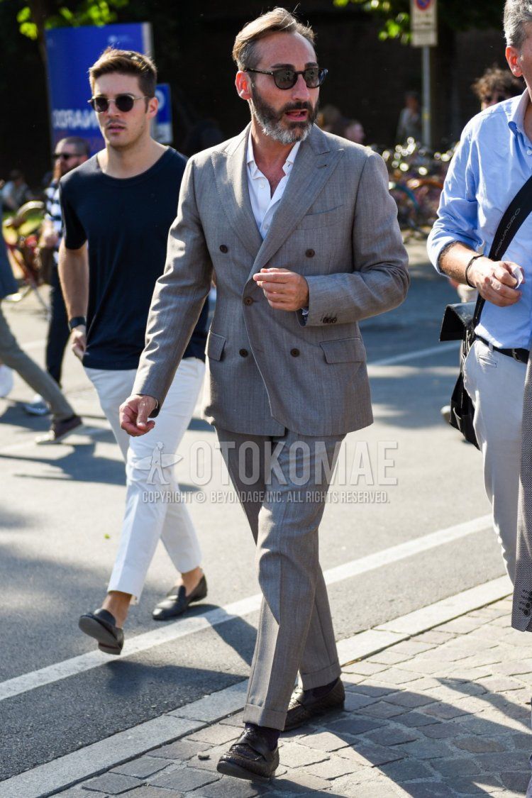 Men's spring/summer/autumn coordination and outfit with plain black sunglasses, plain white shirt, plain black socks, black loafer leather shoes, and plain gray suit from Boston.