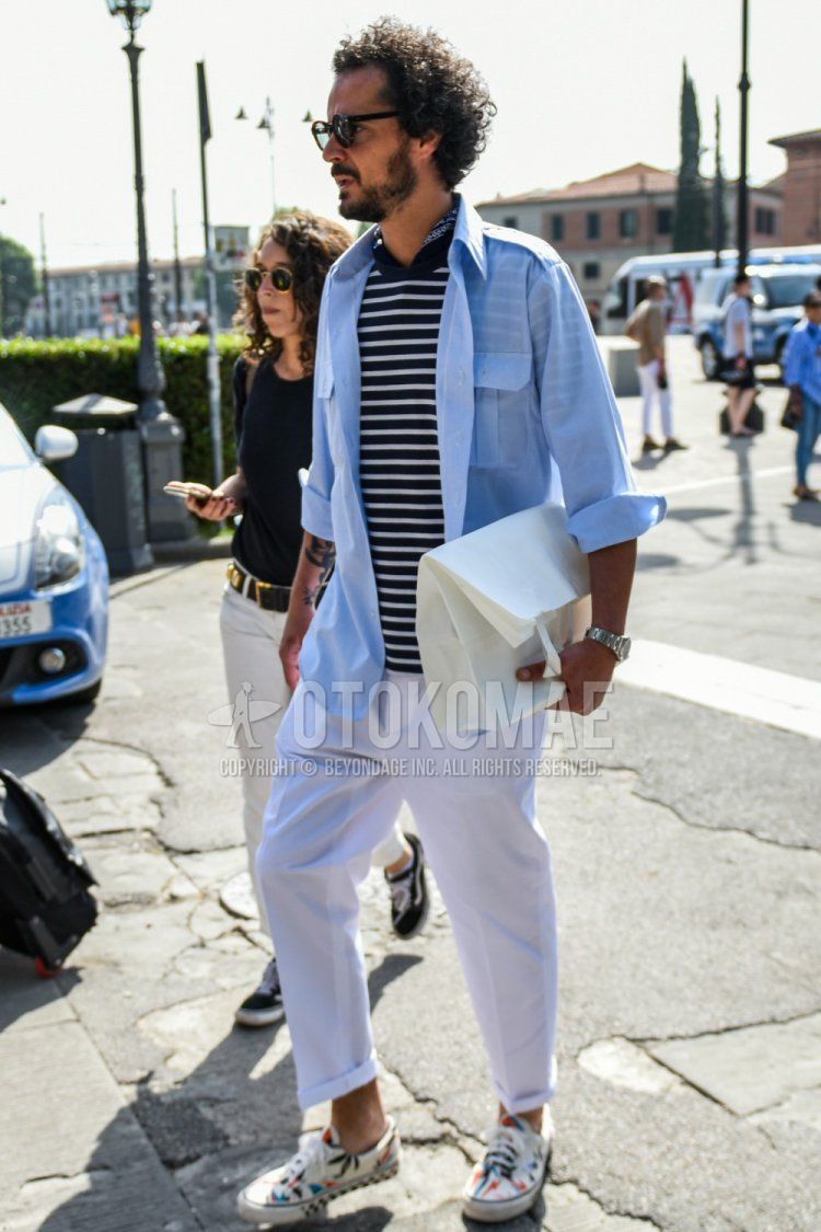 Men's spring/summer coordinate and outfit with plain black glasses, plain black bandana/neckerchief, plain light blue shirt, plain black/white striped t-shirt, plain white cotton pants, and white low-cut sneakers by Vans.