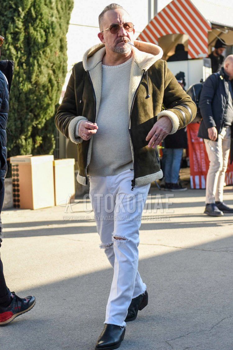 Men's fall/winter coordinate and outfit with plain silver sunglasses, plain olive green leather jacket (except rider's), plain white sweater, plain white damaged jeans, and black boots.