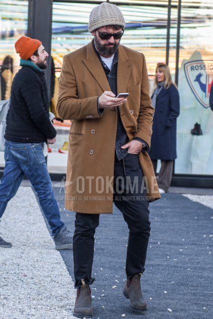 Men's fall/winter coordinate and outfit with solid beige knit cap, solid black sunglasses, solid beige chester coat, solid gray denim jacket, solid white t-shirt, solid dark gray denim/jeans, and brown side gore boots.