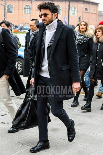 Men's fall/winter outfit with solid color sunglasses, solid color black chester coat, solid color black rider's jacket, solid color white turtleneck knit, solid color gray slacks, black brogue shoes leather shoes, solid color black briefcase/handbag.