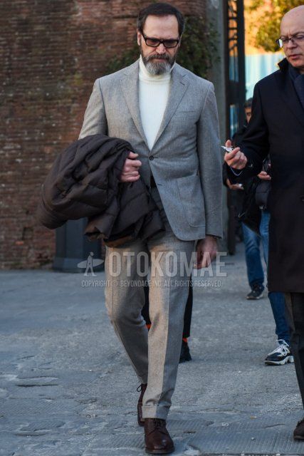 Men's spring and fall coordinate and outfit with plain black sunglasses, plain white turtleneck knit, brown plain-toe leather shoes, and plain gray suit.