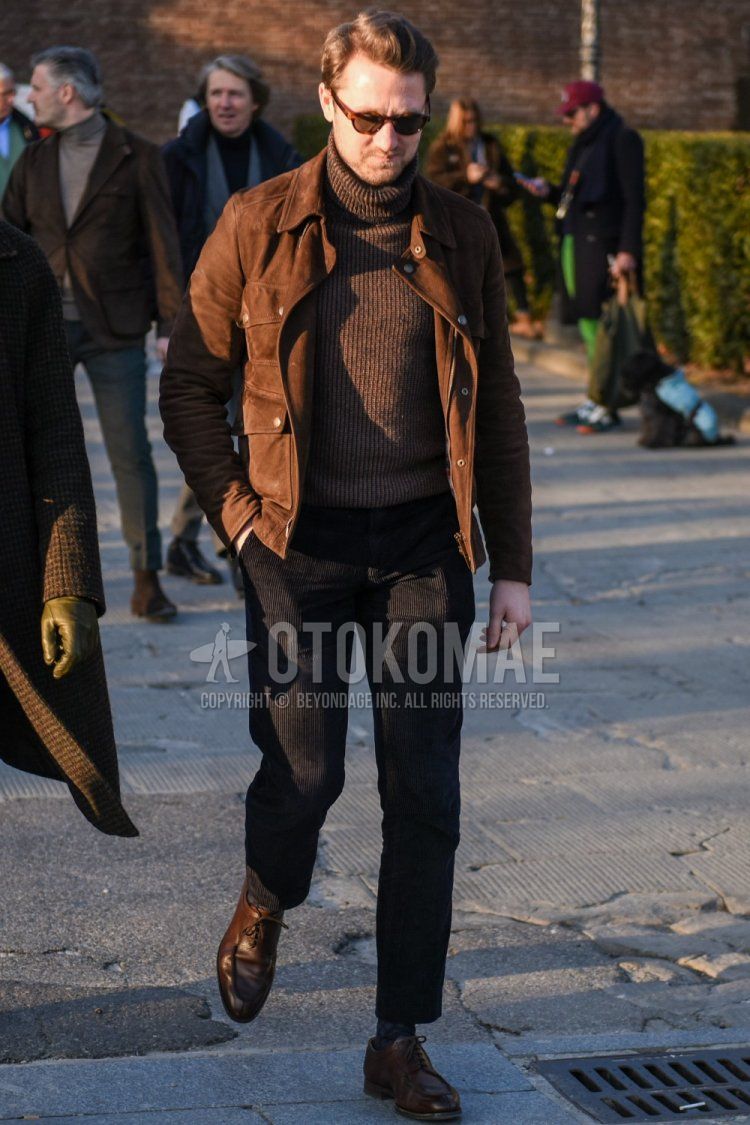 Men's fall/winter outfit with brown tortoiseshell sunglasses, solid brown leather jacket (not riders), solid beige turtleneck knit, solid black winter pants (corduroy, velour), solid black ankle pants, solid gray socks, brown u-tip leather shoes. How to wear.