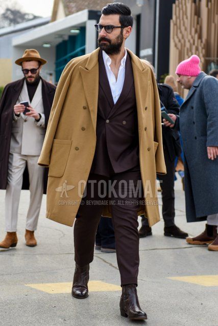 Men's fall/winter coordinate and outfit with brown tortoiseshell glasses, plain beige chester coat, plain white shirt, brown side gore boots, and plain brown suit.