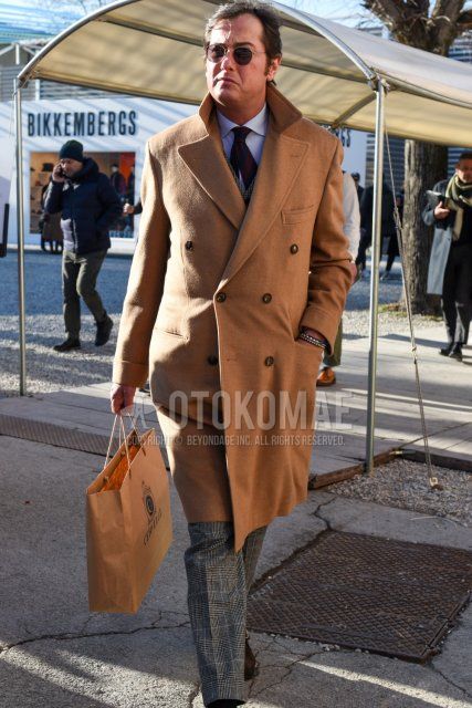 Men's fall/winter coordinate and outfit with round plain silver sunglasses, plain beige chester coat, plain white shirt, and gray checked suit.