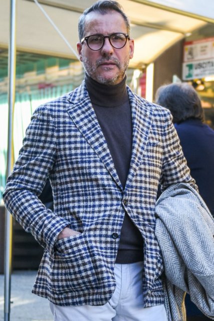 Men's spring and fall outfit with plain black Boston glasses, white/gray checked tailored jacket, plain gray turtleneck knit, plain white cotton pants, plain white ankle pants, and black straight-tip leather shoes.