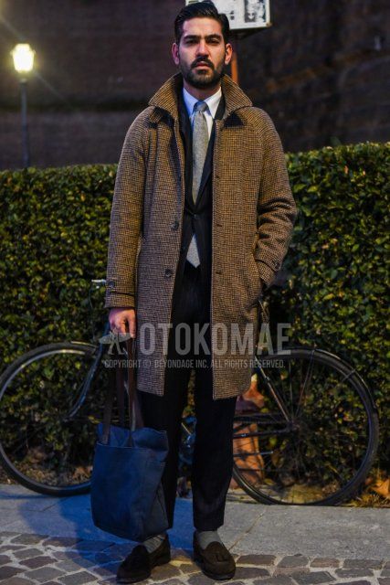 Men's fall/winter coordinate and outfit with brown checked stainless steel coat, plain white shirt, plain gray socks, brown tassel loafer leather shoes, plain navy tote bag, black striped suit, and plain gray tie.