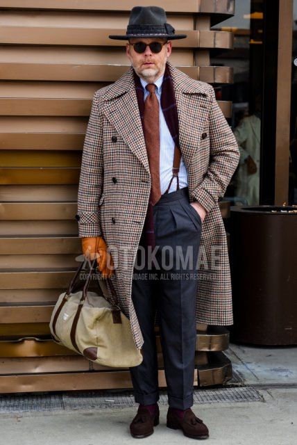 Gray cap hat, Boston brown tortoiseshell sunglasses, brown scarf/stall, beige checked Ulster coat, light blue striped shirt, plain brown suspenders, plain gray slacks, suede brown tassel loafer leather shoes, Fall/winter men's coordinate/outfit with solid beige briefcase/handbag, solid brown tie.