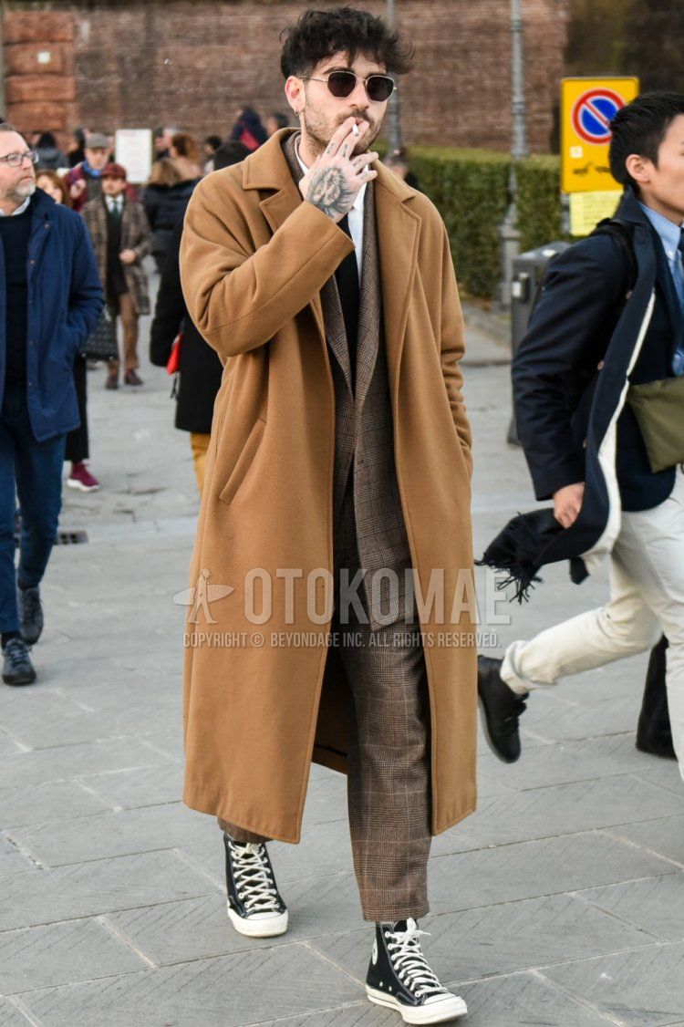 Men's fall/winter coordinate and outfit with plain silver sunglasses, plain beige chester coat, plain white shirt, Converse All Star black high-cut sneakers, and plain black tie.
